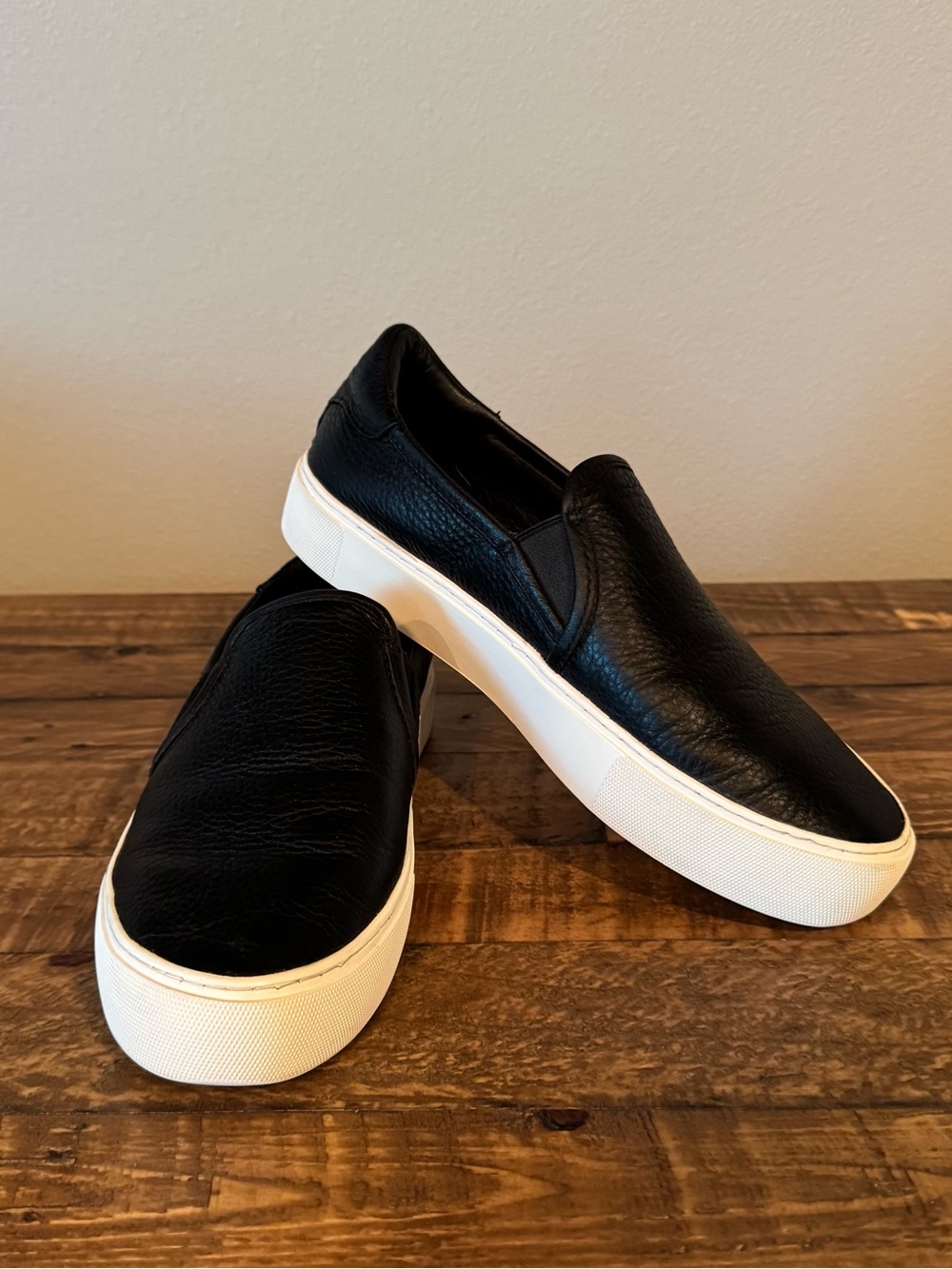 UGG Black Slip-On Leather Flats with White Platform Sole